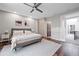 The main bedroom offers a modern aesthetic with a comfortable bed, stylish decor, and plenty of natural light at 1308 Fernwood Ne Cir, Atlanta, GA 30319