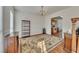 Formal dining room with a large area rug and a view into the kitchen area at 1942 Westover Nw Ln, Kennesaw, GA 30152