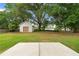 Scenic backyard with a storage shed, providing ample space for gardening, relaxation, and outdoor enjoyment at 2881 Bridle Creek Sw Dr, Conyers, GA 30094