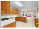 Well-equipped kitchen featuring modern appliances, ample counter space, and seamless connection to the dining area at 2881 Bridle Creek Sw Dr, Conyers, GA 30094