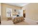 Bedroom featuring soft carpet, large window, and natural light; perfect for relaxation at 4541 Gateway Se Ct, Smyrna, GA 30080