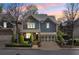 Two-story home with a paved driveway and manicured landscaping, complemented by a two-car garage at 4541 Gateway Se Ct, Smyrna, GA 30080