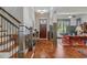 Inviting foyer featuring hardwood floors and a view of the living spaces at 4541 Gateway Se Ct, Smyrna, GA 30080