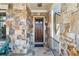 Detailed stone facade highlights the front entrance and wood door at 4541 Gateway Se Ct, Smyrna, GA 30080