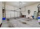 This two-car garage has a concrete floor, a garage door opener, room for storage, and white walls at 4541 Gateway Se Ct, Smyrna, GA 30080