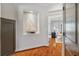 Hallway with decorative shelving, hardwood floors, and an open view of the living space at 4541 Gateway Se Ct, Smyrna, GA 30080