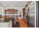 Kitchen with an island featuring granite countertops, stainless-steel appliances, and ample cabinet space at 4541 Gateway Se Ct, Smyrna, GA 30080