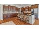 The kitchen features custom wood cabinets, granite countertops, and stainless steel appliances at 4541 Gateway Se Ct, Smyrna, GA 30080