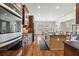 Bright kitchen features dark wood cabinets, a large island, and stainless steel appliances at 4541 Gateway Se Ct, Smyrna, GA 30080