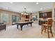 Recreation room with a pool table, bar area, and ample space for entertainment and relaxation at 4541 Gateway Se Ct, Smyrna, GA 30080