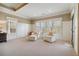 Sun-filled sitting area with neutral colors, bright windows, and plush seating for relaxation at 4541 Gateway Se Ct, Smyrna, GA 30080