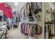 Spacious walk-in closet with extensive shelving and storage for organized apparel at 4541 Gateway Se Ct, Smyrna, GA 30080