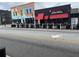 View of nearby businesses with outdoor dining, enhancing the neighborhood's appeal at 1829 Mercer Ave., College Park, GA 30337