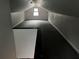Finished attic space with carpet, ample lighting and additional storage at 1829 Mercer Ave., College Park, GA 30337