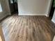 Inviting living room showcasing beautiful wood floors and fresh paint at 1829 Mercer Ave., College Park, GA 30337