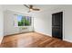 Bright bedroom showcasing hardwood floors, large windows, and spacious layout at 2479 Peachtree Ne Rd # 305, Atlanta, GA 30305
