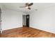 Bedroom features hardwood floors, ceiling fan and ensuite access at 2479 Peachtree Ne Rd # 305, Atlanta, GA 30305
