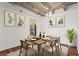 Dining room with hardwood floors, exposed concrete ceiling, and modern decor at 2479 Peachtree Ne Rd # 305, Atlanta, GA 30305