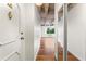 Bright hallway with hardwood floors and a mirrored closet door at 2479 Peachtree Ne Rd # 305, Atlanta, GA 30305