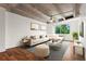 Stylishly furnished living room with hardwood floors, modern decor, and natural light at 2479 Peachtree Ne Rd # 305, Atlanta, GA 30305