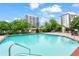 Community swimming pool with clear blue water on a sunny day at 2479 Peachtree Ne Rd # 305, Atlanta, GA 30305
