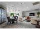 Bright recreation room with sofas, table, billiard table, and carpeted floors overlooking the outdoor patio at 2479 Peachtree Ne Rd # 305, Atlanta, GA 30305