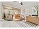 Bright sunroom, seamlessly flowing into the main living area, offering a cozy and inviting space to relax at 4120 Valley Wood Nw Dr, Marietta, GA 30064