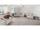 Spacious living room with a breakfast bar, a plush sectional sofa, and a ceiling fan at 4608 Treasure Ct, Forest Park, GA 30297