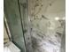 Bathroom featuring enclosed shower with glass and marble surround at 4889 Fairforest Dr, Stone Mountain, GA 30088
