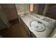 Bathroom with a double sink vanity, a large mirror, and plenty of counter space at 4889 Fairforest Dr, Stone Mountain, GA 30088