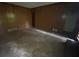 A living room with panel walls and dull flooring, presents an opportunity for renovation at 4889 Fairforest Dr, Stone Mountain, GA 30088