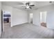Spacious main bedroom with multiple windows and ceiling fan at 6100 Semaphore Rdg, Rex, GA 30273