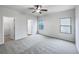Spacious main bedroom with multiple windows, and ceiling fan at 6100 Semaphore Rdg, Rex, GA 30273