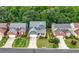 A view of a well-manicured neighborhood and a charming home at 1536 Fenmore St, Lithia Springs, GA 30122