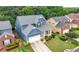 Aerial view of a two-story home with well-maintained landscaping and a gray roof at 1536 Fenmore St, Lithia Springs, GA 30122