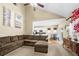 Open-concept living room flows into the kitchen and dining area, with a large sectional sofa at 1536 Fenmore St, Lithia Springs, GA 30122