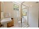 Bright bathroom with white subway tile shower and charming pedestal sink with natural light at 2 W Muscogee Nw Ave, Atlanta, GA 30305