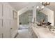 Bright bathroom featuring a marble sink and shower with tiled walls and floors at 2 W Muscogee Nw Ave, Atlanta, GA 30305