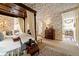 Bright bedroom with toile wallpaper, four poster bed, and neutral carpet at 2 W Muscogee Nw Ave, Atlanta, GA 30305
