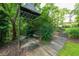 Charming backyard gazebo with stone pathway and lush greenery, offering a peaceful retreat at 2 W Muscogee Nw Ave, Atlanta, GA 30305