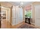 Charming hallway with built-in storage and a table with a view to the outside at 2 W Muscogee Nw Ave, Atlanta, GA 30305