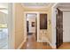 Open hallway with a view to a bathroom and an open door, perfect for easy navigation and access at 2 W Muscogee Nw Ave, Atlanta, GA 30305
