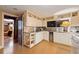 Bright kitchen featuring stainless steel counters and classic cabinetry at 2 W Muscogee Nw Ave, Atlanta, GA 30305