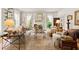 Bright and stylish living room with fireplace, bookshelves, and neutral decor at 2 W Muscogee Nw Ave, Atlanta, GA 30305
