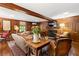 Elegant living room with wood paneling, fireplace, and traditional decor at 2 W Muscogee Nw Ave, Atlanta, GA 30305