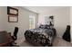 Bedroom with natural light, a decorative painting, and a desk at 2530 Vistoria Dr, Cumming, GA 30041
