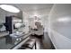 Open kitchen featuring an island with bar stools that looks into the dining area at 123 Mill Ln, Dallas, GA 30157