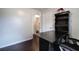 Charming home office featuring hardwood floors, and a large desk at 123 Mill Ln, Dallas, GA 30157