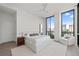 Bedroom features large windows, a ceiling fan, and hardwood floors at 2425 Peachtree Ne Rd # 1503, Atlanta, GA 30305