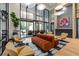 Inviting conference room and lounge area featuring stylish furniture and a plant at 2425 Peachtree Ne Rd # 1503, Atlanta, GA 30305